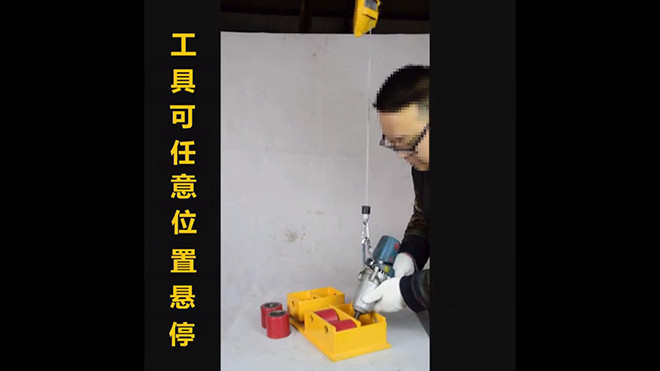 弹簧平衡器使用于搬运小坦克车轮装配中